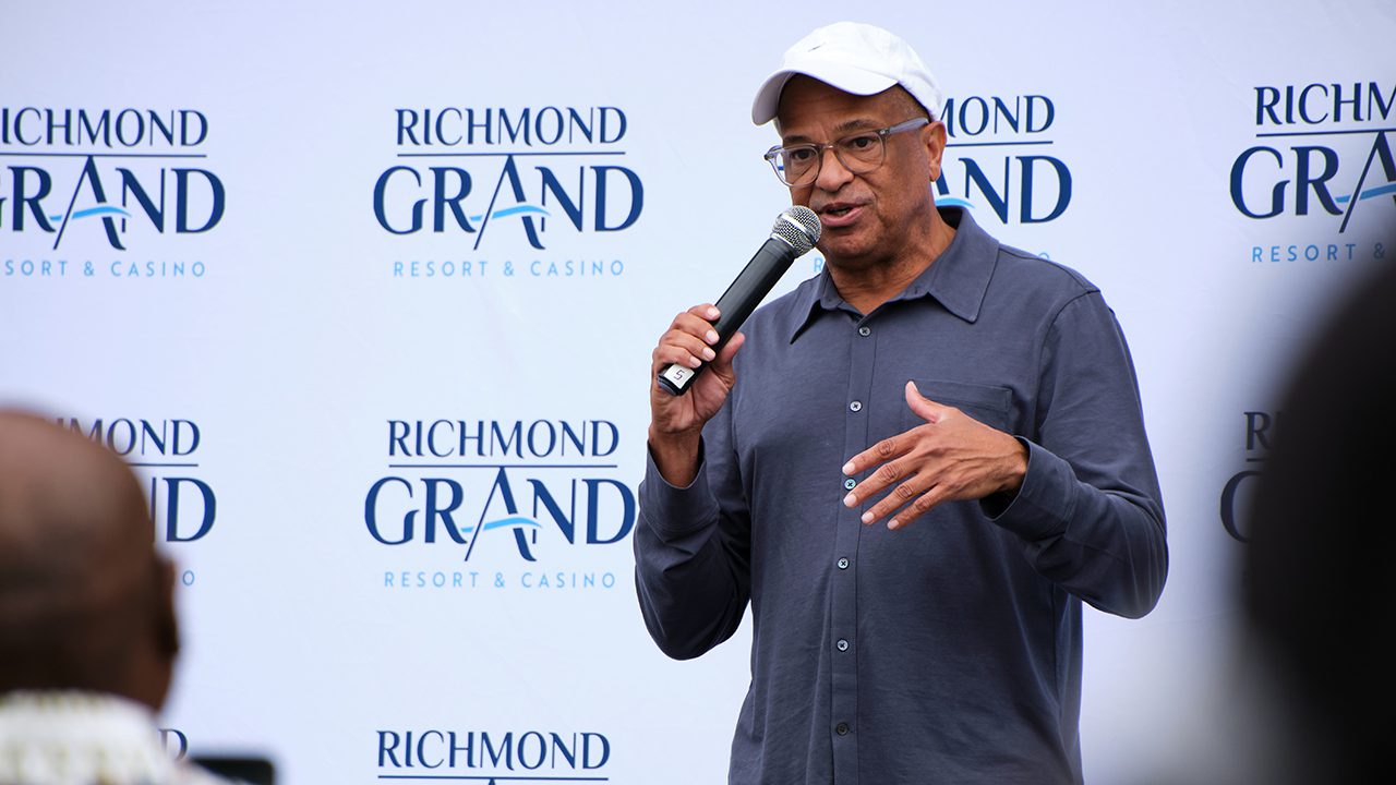 Urban CEO Alfred Liggins addresses supporters at a block party organized by his company and Churchill Downs, Richmond, Va., Sept. 30, 2023. The two companies are urging voters to approve a $562 million resort casino in Virginia's state capital.